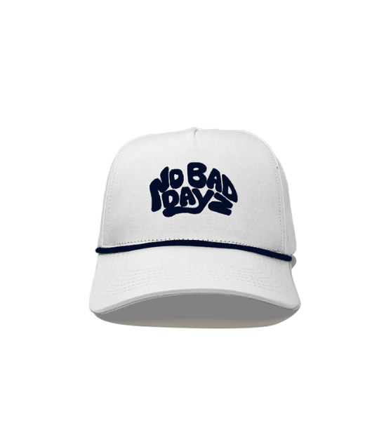 Man wearing white "No bad dayz" hat with white rope brim and black letters